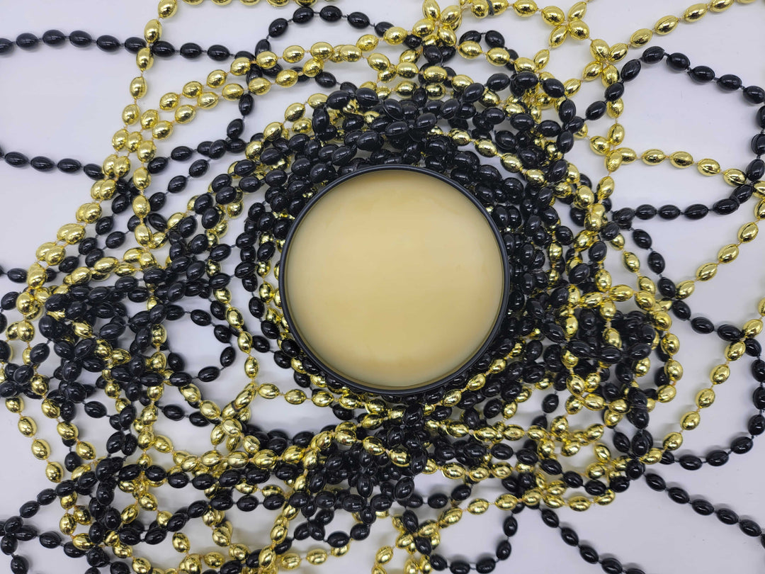 Open 4 oz tin of Citrus Crush Beard Balm made with shea butter, apricot & rosehip oil & other 100% natural ingredients.