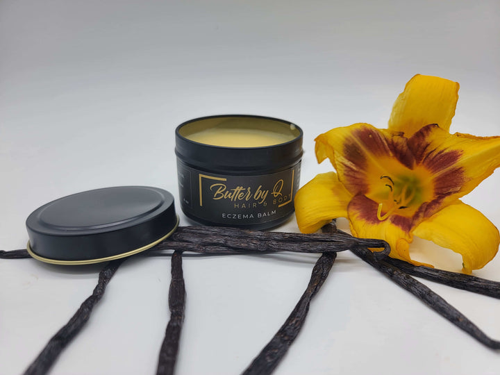 Open 4 oz container of Butter by Q's Eczema Balm made with shea butter, apricot, jojoba & other 100% natural ingredients.