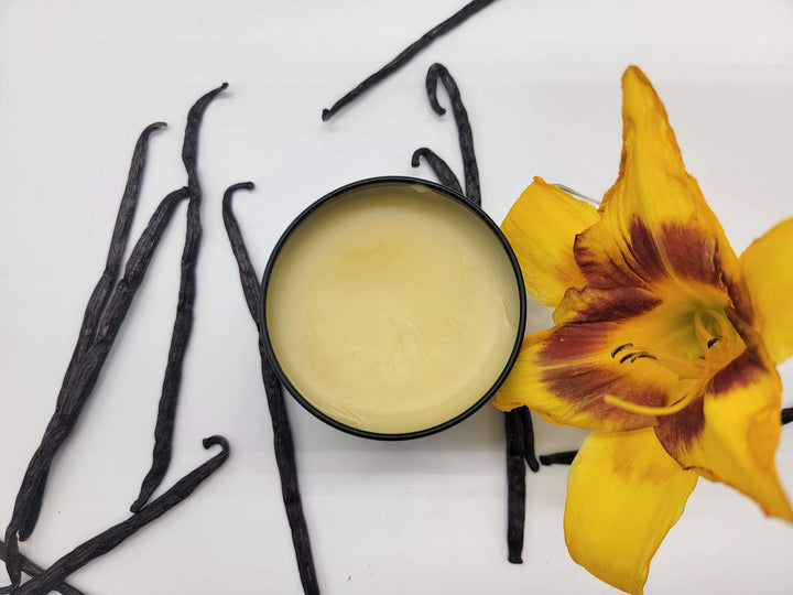 Overhead view of Butter by Q's Eczema Balm made with shea butter, apricot, jojoba & other 100% natural premium ingredients.