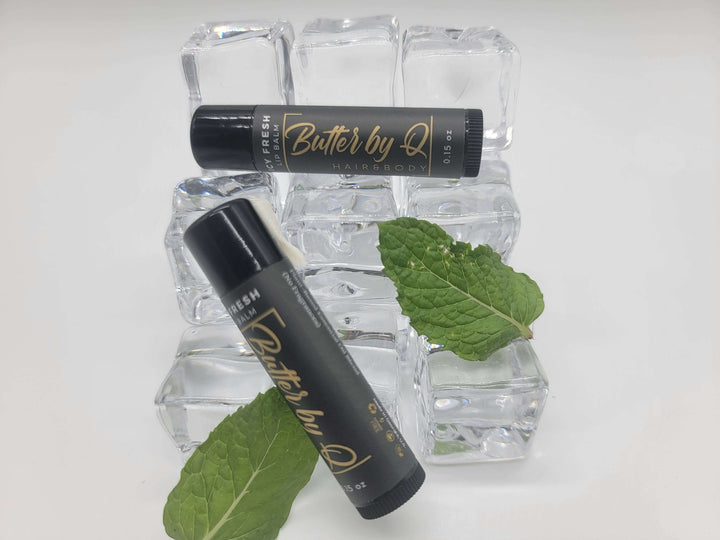 Two .15 oz tubes of Icy Fresh Lip Balm in a premium black tube. It's made with shea butter, mango butter, and premium oils.