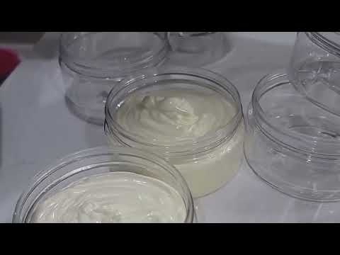 Silky Smooth Operator whipped shea butter is poured into clear 8 oz containers. It's made with natural oils & nutrients.